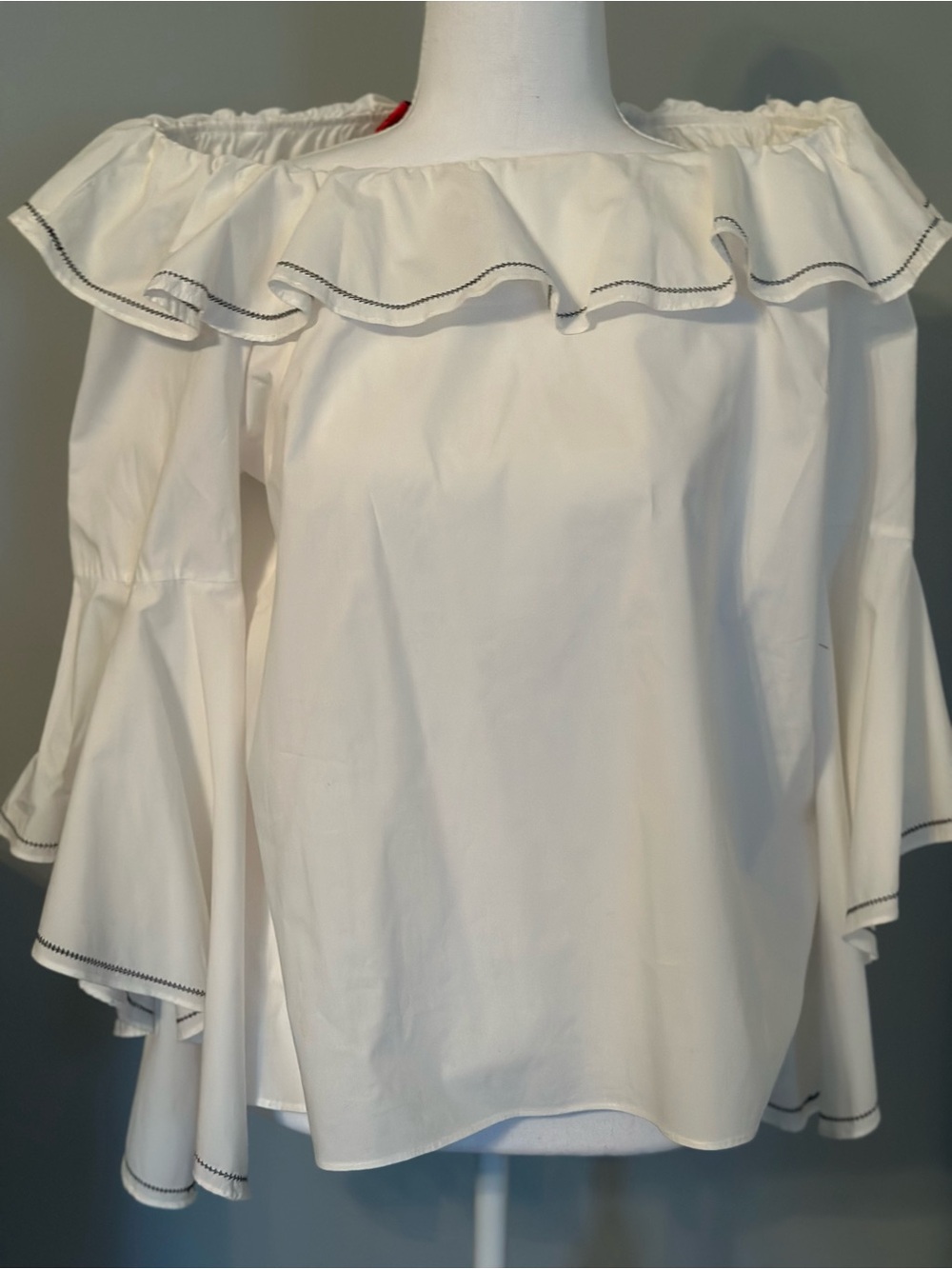 Christina White Off-Shoulder Ruffle Blouse with Contrast Stitch